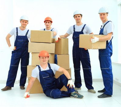 Boxes and furniture being assessed for a load-based quote