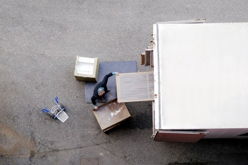 Van ready for a student move with boxes and furniture in Teddington