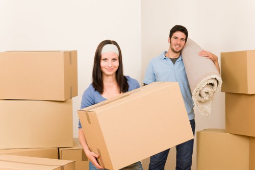 Loading furniture and boxes into a local moving truck