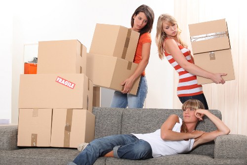Office furniture and equipment being prepared for a local move