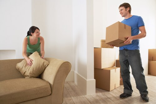 A local team handling storage items with care in Teddington