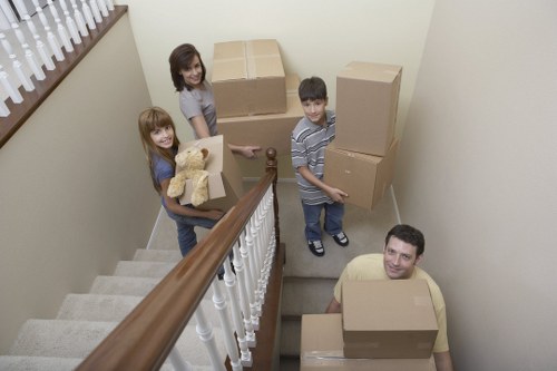 Local movers handling furniture and boxes in Teddington